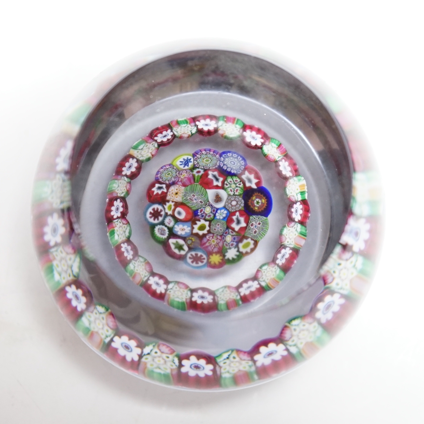 A Paul Ysart concentric millefiori garland glass paperweight, Harland period, ‘PY’ cane, 7.5cm